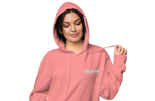 BLOW | LIMITED EDITION | UNISEX PIGMENT-DYED HOODIE is a cozy and stylish wardrobe staple for any fashion-savvy individual.